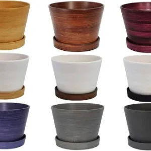 Nine colored ceramic planters with saucers in a grid